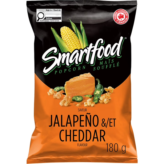 Smartfood Jalapeno & Cheddar Seasoned Popcorn packaging, showing the bag and seasoned popcorn